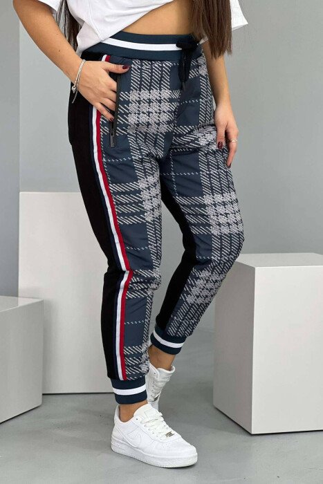 TUTA ME DIZANJO ABSTRAKTE PËR FEMRA NË NGJYRËN BLU - KLAUDIO FASHION