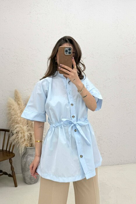 BLUZE NJE NGJYRESHE ME NENGE TE SHKURTRA ME LIDHESE NE BEL PER FEMRA NE NGJYRE BABY BLU - 1