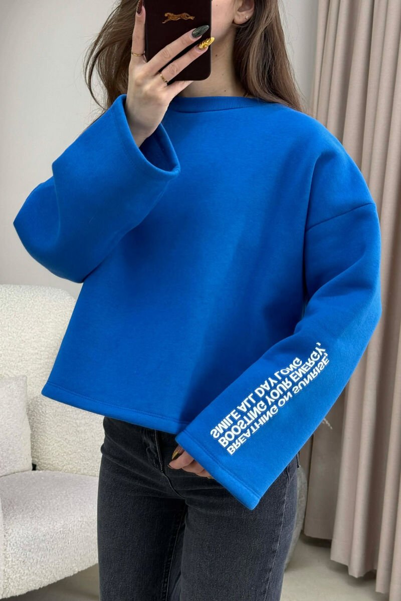 BLUZE NJE NGJYRESHE ME PUSH DHE ME SHKRIME NE PJESEN E PASME PER FEMRA NE NGJYRE BLU - 2