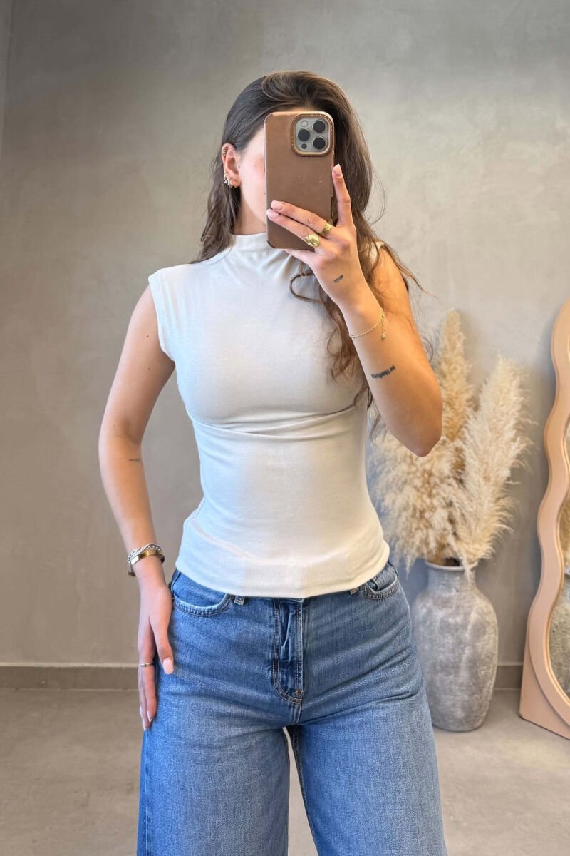BLUZE PA MENGE ME GJYSEM GOLF PER FEMRA NE NGJYRE BEZHE - 1