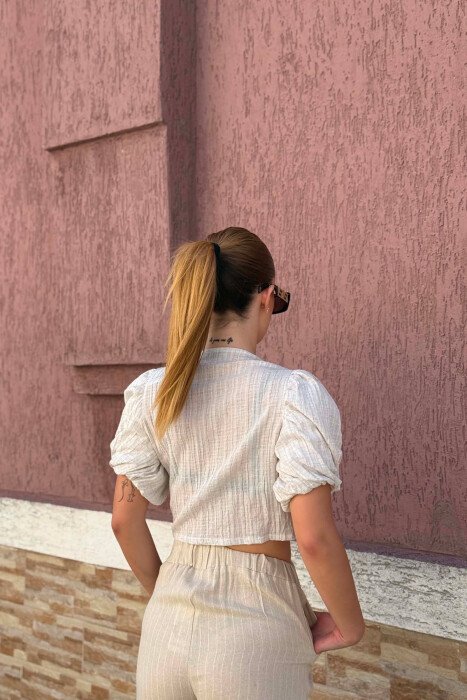 CROP TOP NJE NGJYRESH ME MENGE TE SHKURTRA PER FEMRA NE NGJYRE KREM - 5