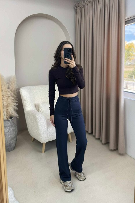 TUTA ME DIZAN ELASTIK NË BELI DHE ME LIDHËSE PËR FEMRA NË NGJYRË BLU TË ERRËT - KLAUDIO FASHION
