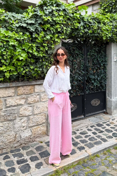 PANTALLONA NJËNGJYRËSHE ELASTIKE NË BELI PËR FEMRA NË NGJYRE ROZE - KLAUDIO FASHION