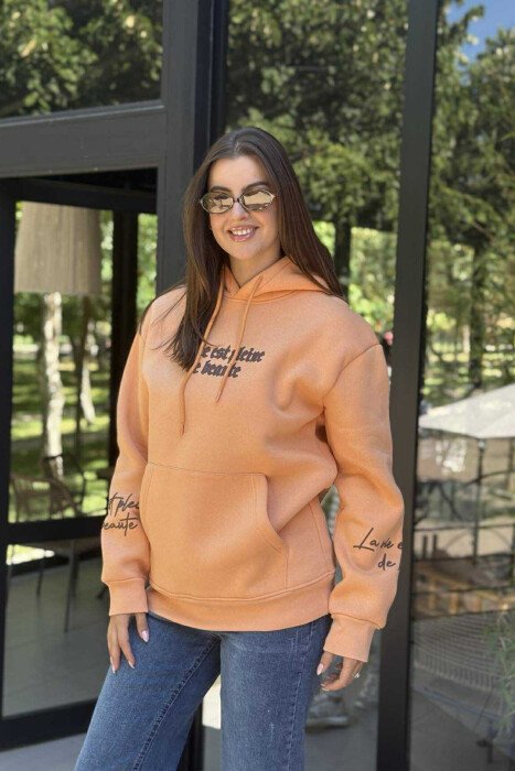 HOODIE ME PUSH NJËNGJYRËSHE DHE DIZANJ MBRAPA PËR FEMRA NË NGJYRËN PORTOKALLI 