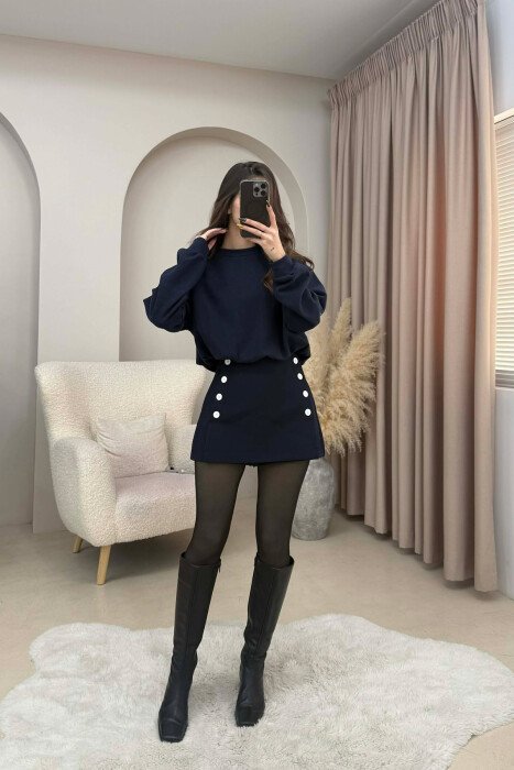 FUNDPANTALLONE NJE NGJYRESHE ME DETAJIN E BUTONAVE PER FEMRA NE NGJYRE BLU TE ERRET - 3