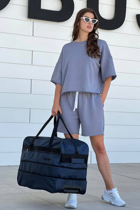 HANDLE AND WHEEL TRAVELING BAG DARK BLUE/BEE - 