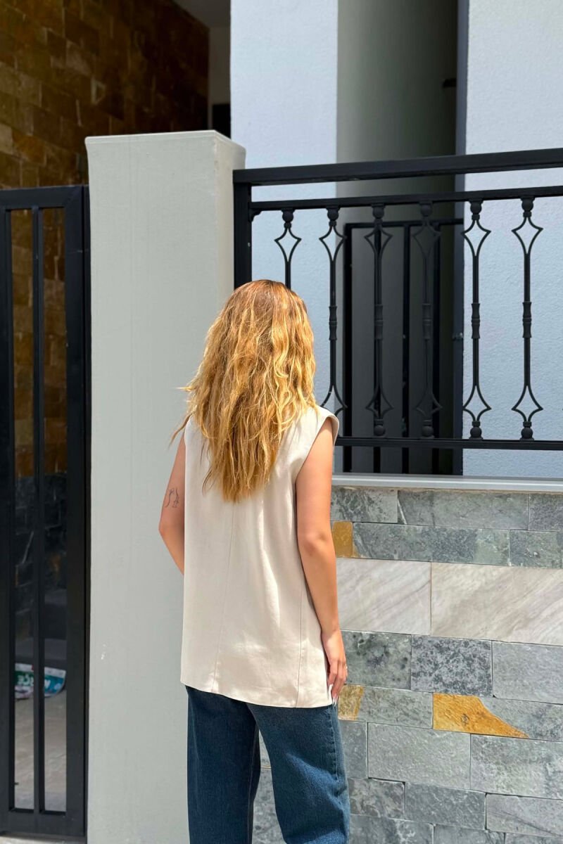 JELEK I THJESHTE NJE NGJYRESH ME BUTONA PER FEMRA NE NGJYRE BEZHE - 6