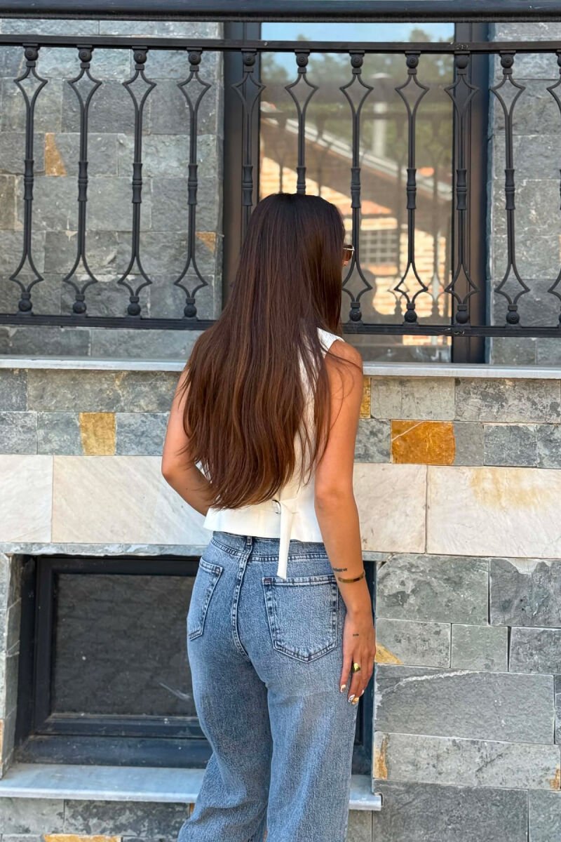 JELEK NJE NGJYRESH ME BUTONA NE FORME FJONGOSH PER FEMRA NE NGJYRE TE BARDHE - 3