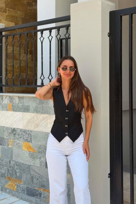 JELEK NJE NGJYRESH ME BUTONA NE FORME FJONGOSH PER FEMRA NE NGJYRE TE ZEZE - 5