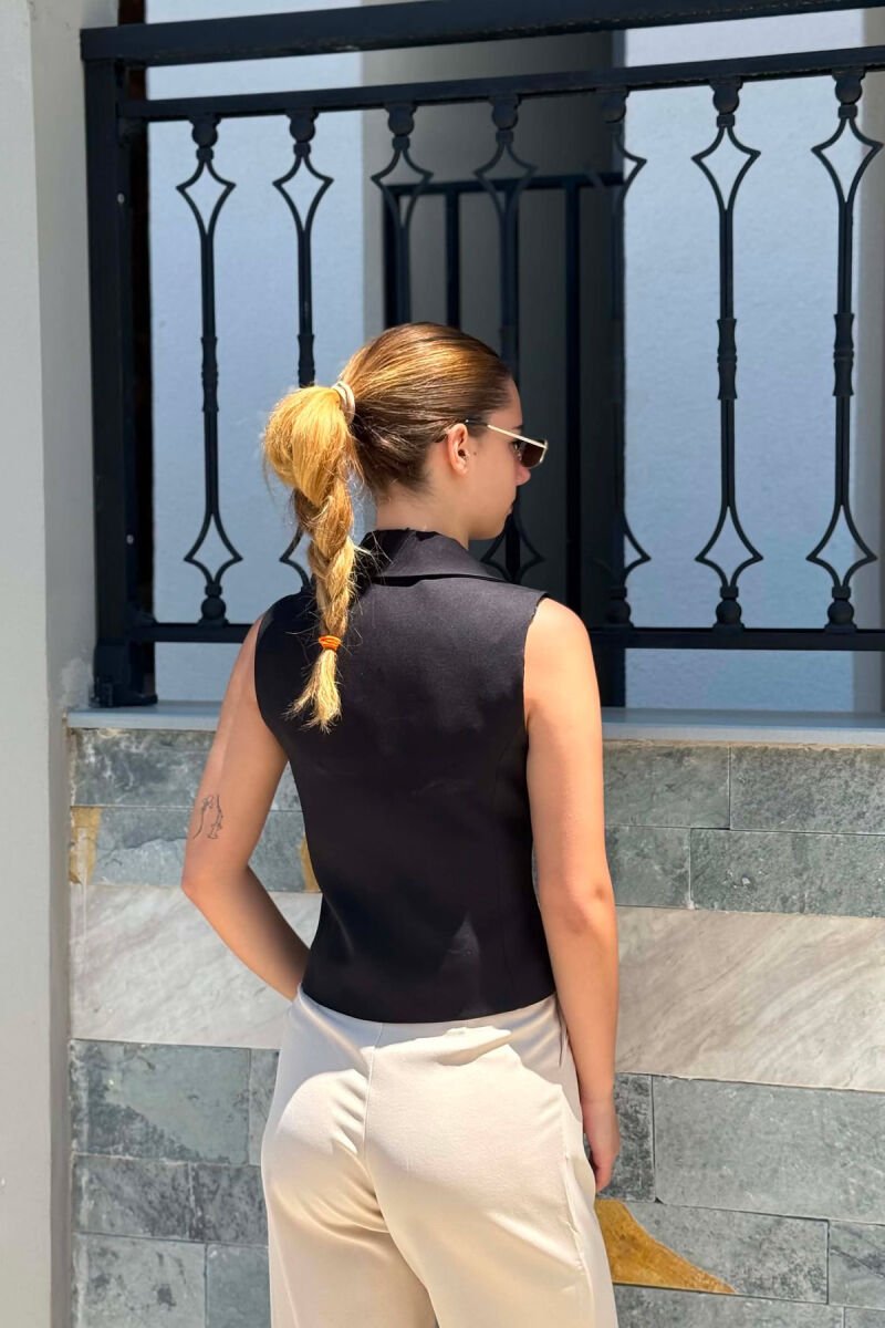 JELEK NJE NGJYRESH ME DY BUTONA PER FEMRA NE NGJYRE TE ZEZE - 3