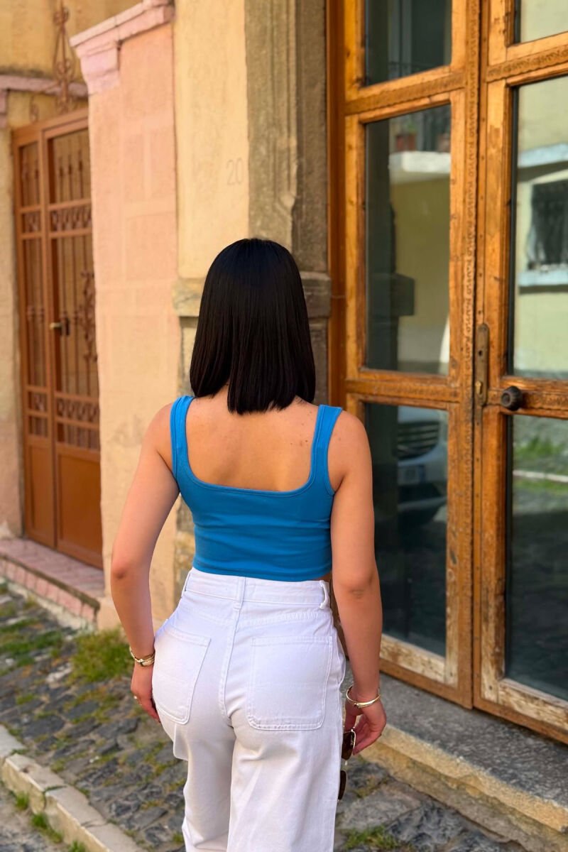 KANATJERE E THJESHTE NJE NJGYRESHE PER FEMRA NE NGJYRE BLU TE ZBARDHUR - 3