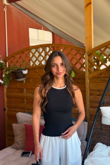KANATJERE E THJESHTE PER FEMRA NE NGJYRE TE ZEZE - 