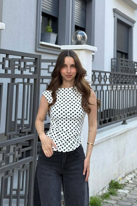 KANATJERE ME PIKA PER FEMRA NE NGJYRE TE BARDHE 
