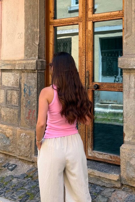 KANATJERE NJE NGJYRESHE ME DETAJIN E BUTONAVE PER FEMRA NE NGJYRE ROZE - 4