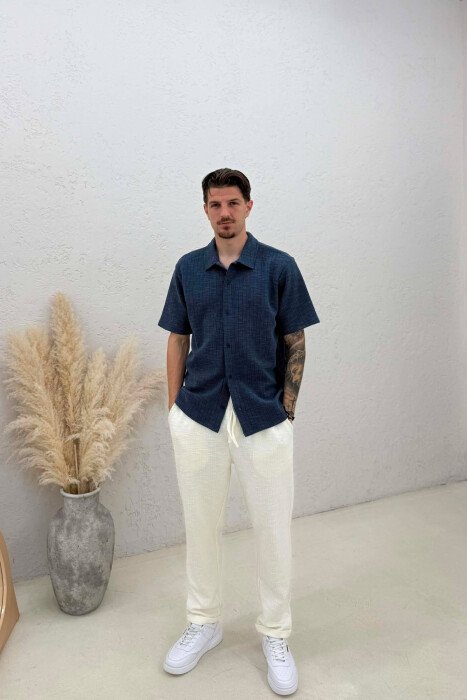 KËMISHË E THJESHTË NJË NGJYRËSHE PËR MESHKUJ NË NGJYRËN BLU - 2