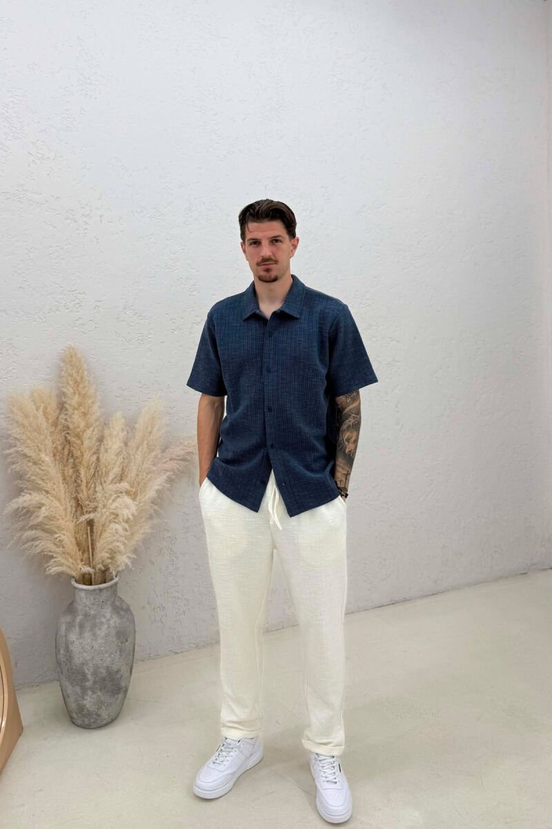 KËMISHË E THJESHTË NJË NGJYRËSHE PËR MESHKUJ NË NGJYRËN BLU - 2