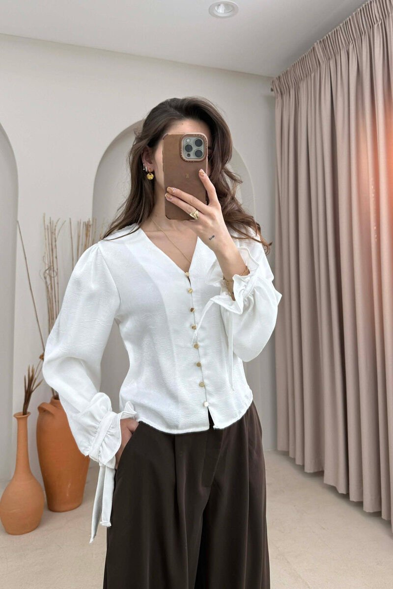 KEMISHE ME BUTONA GOLD PER FEMRA NE NGJYRE TE BARDHE - 1