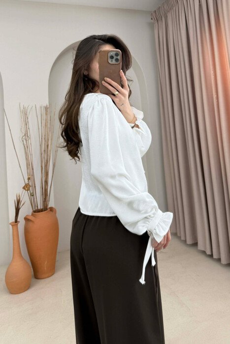 KEMISHE ME BUTONA GOLD PER FEMRA NE NGJYRE TE BARDHE - 4