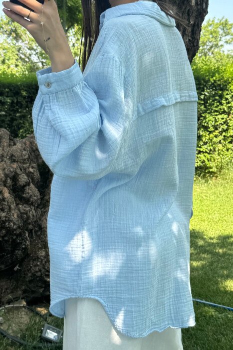 KËMISHE NJË NGJYRËSHE E THJESHTË PËR FEMRA NË NGJYRËN BLU E ZBARDHUR - 4
