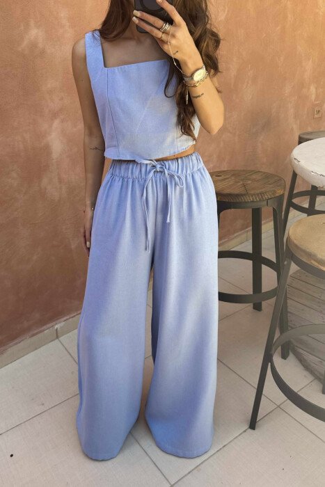 KOSTUM NJËNGJYRËSH CROP TOP +PANTALLONA PËR FEMRA NË NGJYRËN BLU TË ZBARDHUR - 2