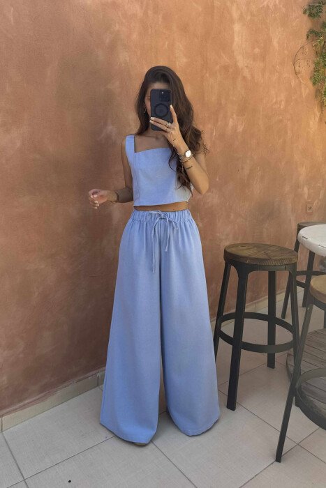 KOSTUM NJËNGJYRËSH CROP TOP +PANTALLONA PËR FEMRA NË NGJYRËN BLU TË ZBARDHUR - 4