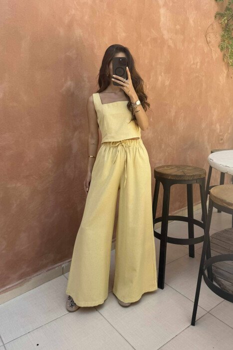 KOSTUM NJËNGJYRËSH CROP TOP +PANTALLONA PËR FEMRA NË NGJYRËN MUSTARDË - 4