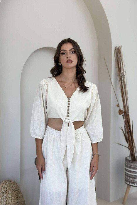 KOSTUM PËR FEMRA CROP DHE PANTALLONA NË NGJYRË KREM - 3