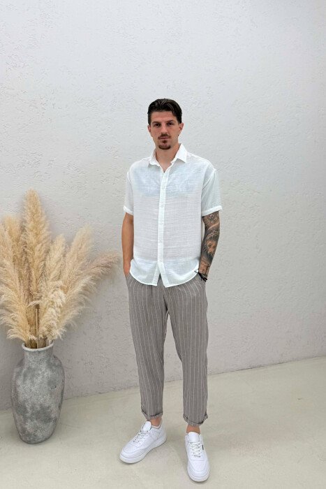 PANTALLONA ME DIZAJN VIJASH DHE ME LIDHESE TEK BELI PER MESHKUJ NE NGJYRE KAFE TE ZBARDHUR - KLAUDIO FASHION