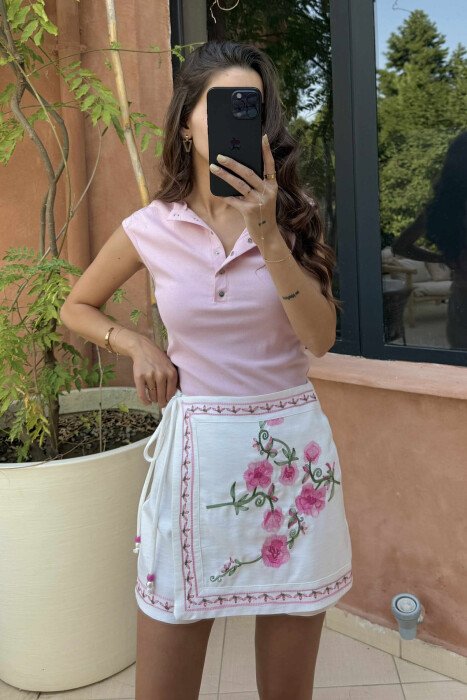 KANATIERE NJË NGJYRËSHE ME KOPSA PËR FEMRA NË NGJYRËN BABY PINK 