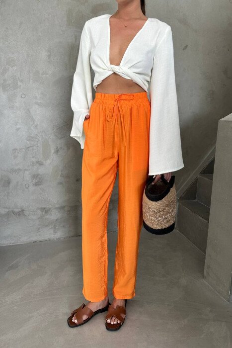 PANTALLONA NJE NGJYRESHE ME BEL ELASTIK PER FEMRA NE NGJYRE PORTOKALLI - KLAUDIO FASHION