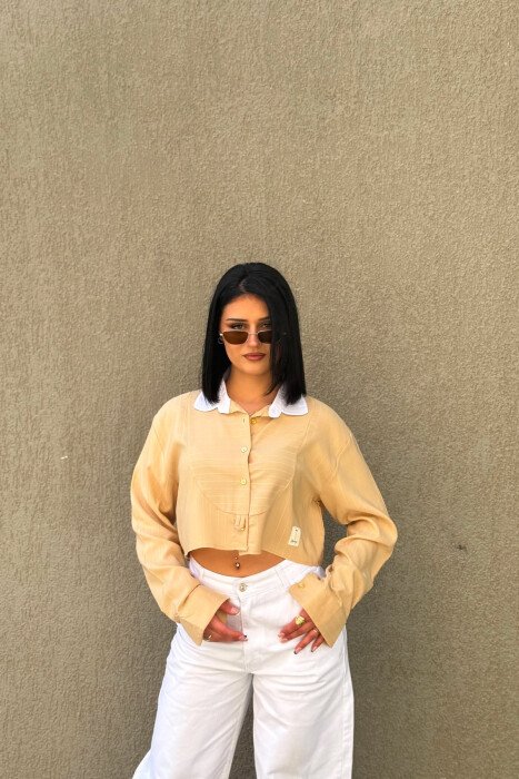 KEMISHE NJE NGJYRESHE ME BUTONA GOLD PER FEMRA NE NGJYRE BEZHE 