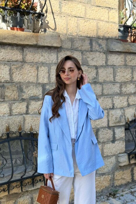XHAKETE E THJESHTE NJE NGJYRESHE PER FEMRA NE NGJYRE BABY BLU - KLAUDIO FASHION
