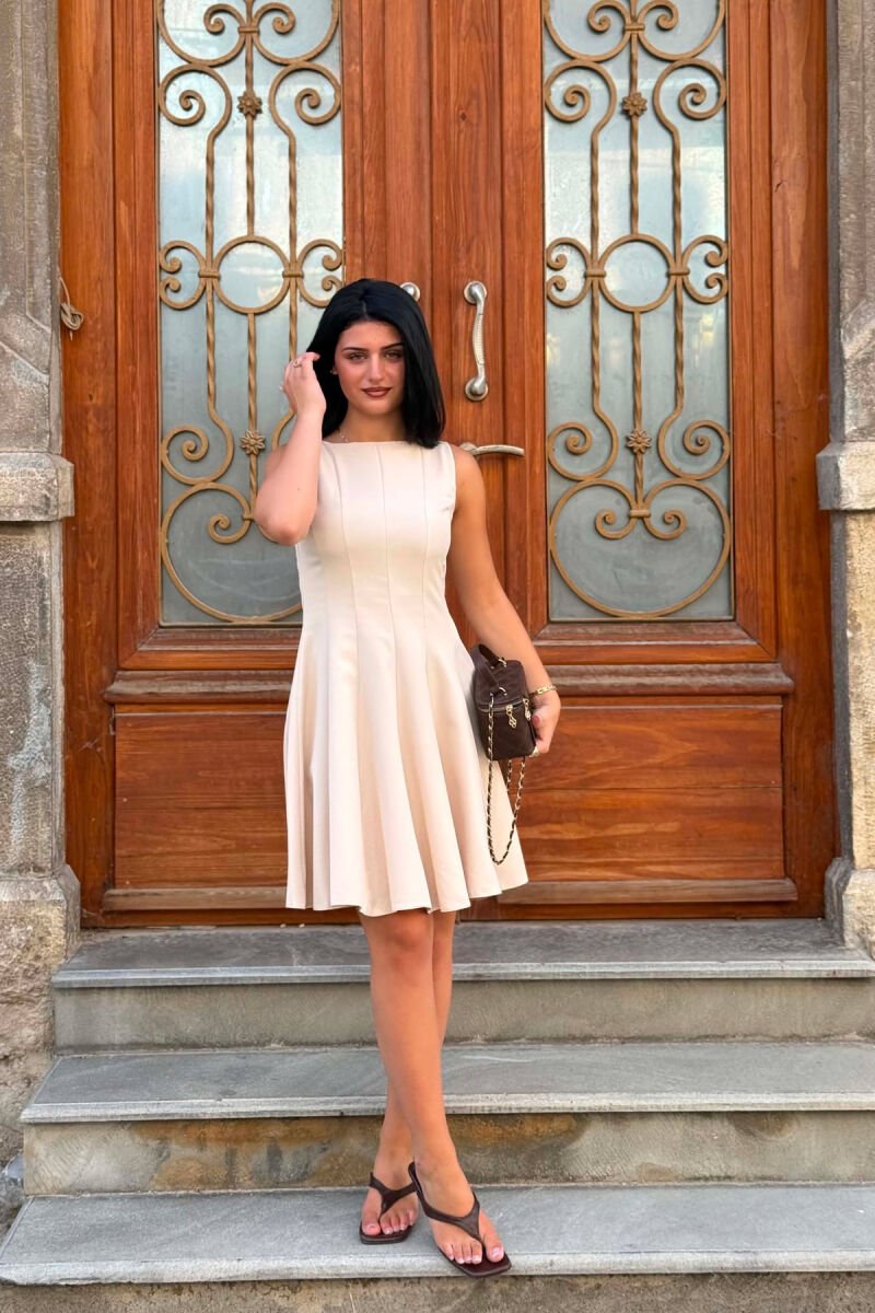 cream color dress Structured Midi | Trendy Women's Clothing and the pleated skirt allows for unrestricted movement Cream color wedding gown |