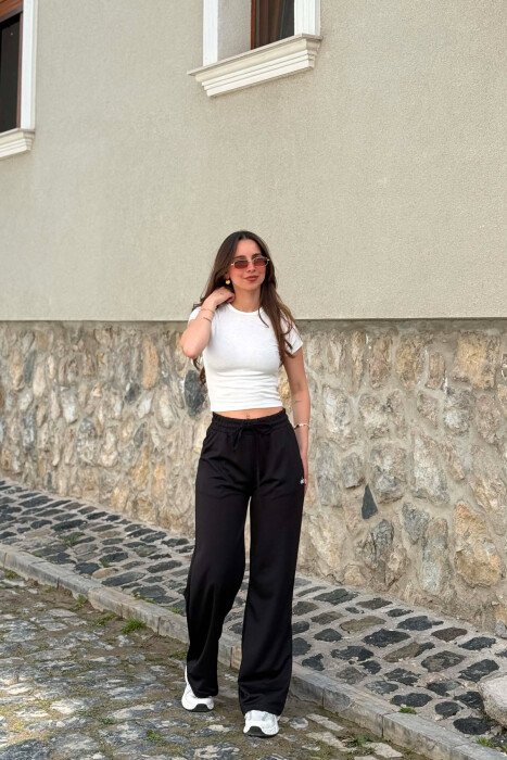 ONE COLOR WRITTINGS WOMAN SWEATPANTS BLACK/ E ZEZE - 1