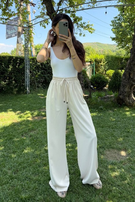 PANTALLONA NJË NGJYRËSHE TË GJERA PËR FEMRA NË NGJYRË KREM - KLAUDIO FASHION