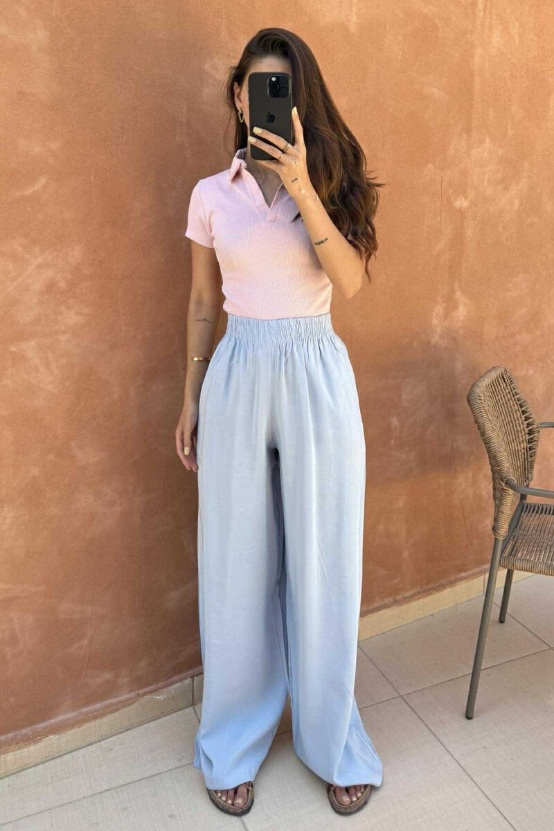 PANTALLONA NJË NGJYRËSHE TË THJESHTA PËR FEMRA NË NGJYRËN BABY BLUE - 2