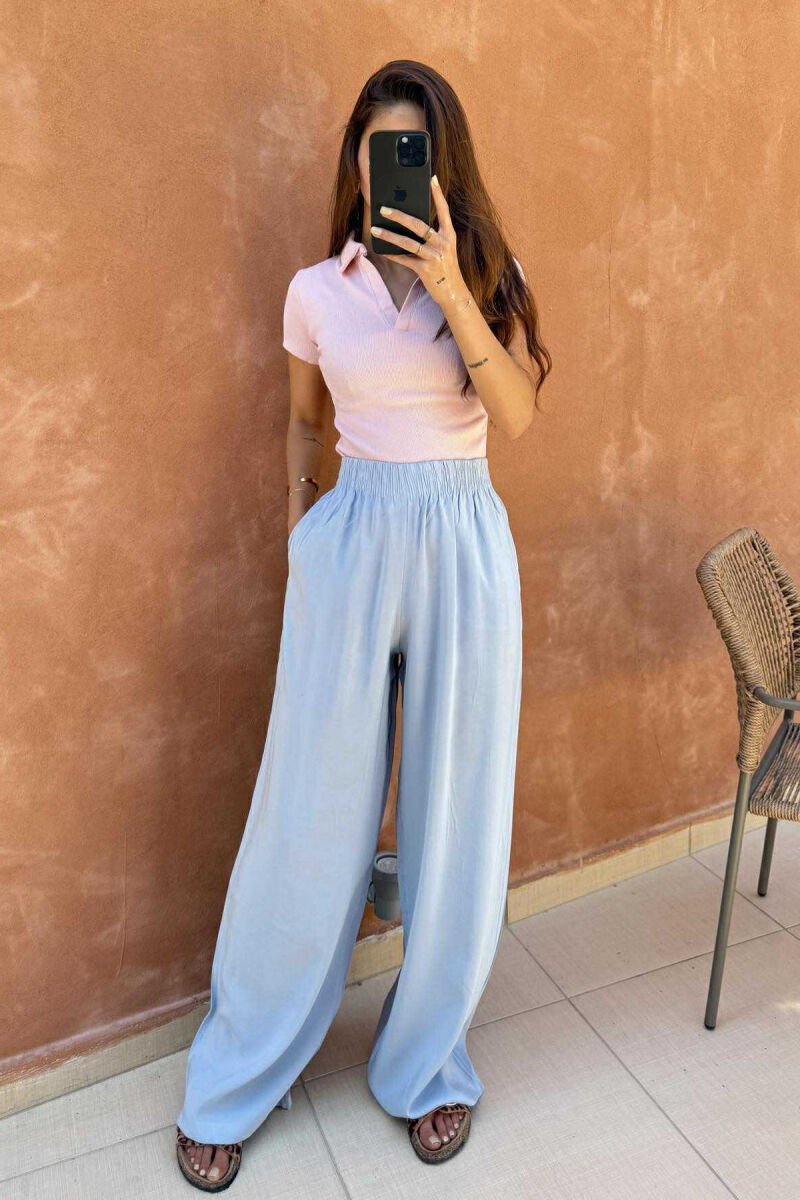 PANTALLONA NJË NGJYRËSHE TË THJESHTA PËR FEMRA NË NGJYRËN BABY BLUE - 3