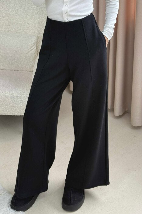 PANTALONA TE GJERA NJE NGJYRESHE ME BEL ELASTIK PER FEMRA NE NGJYRE TE ZEZE - 1