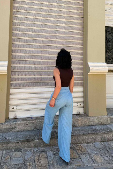 PANTALLONA TE GJERA NJE NGJYRESHE PER FEMRA NE NGJYRE BLU TE ZBARDHUR - 3