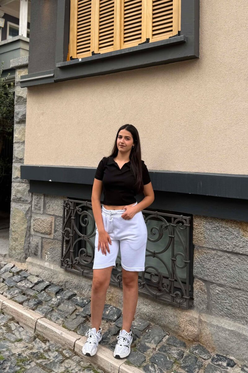PANTALLONA TE SHKURTRA NJE NGJYRESHE TE THJESHTA PER FEMRA NE NGJYRE TE BARDHE - 1