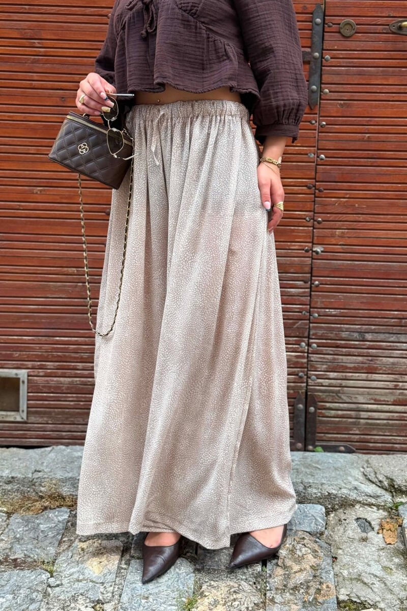 PANTALONA TE GJERA ME DIZENJO TE NDRYSHME PER FEMRA NE NGJYRE BEZHE - 3