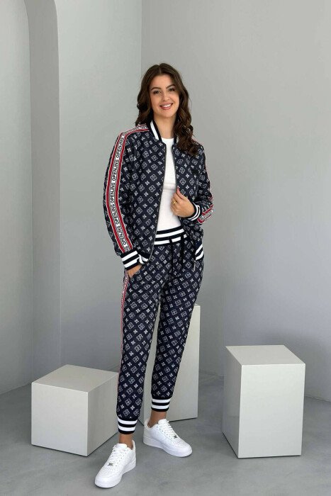 KOSTUM ME DIZANJE XHAKETË DHE TUTA PËR FEMRA NË NGJYRËN BLU TË ERRËT - KLAUDIO FASHION