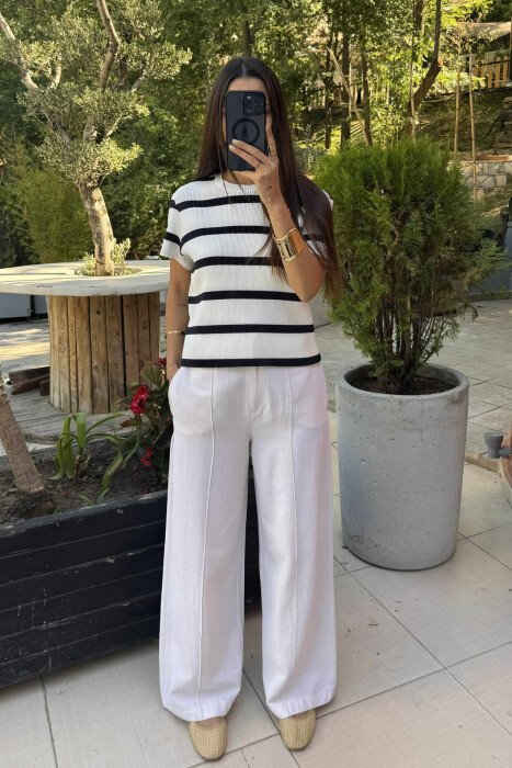 T-SHIRT ME DIZAJNIN E VIJAVE PËR FEMRA NË NGJYRËN E BARDHË DHE E ZEZË - KLAUDIO FASHION