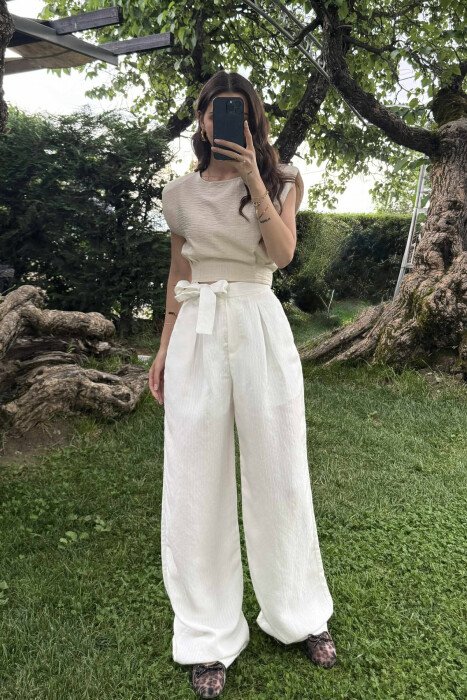KANATJERE NJË NGJYRËSHE ME BEL ELASTIK PËR FEMRA NË NGJYRËN KREM - KLAUDIO FASHION