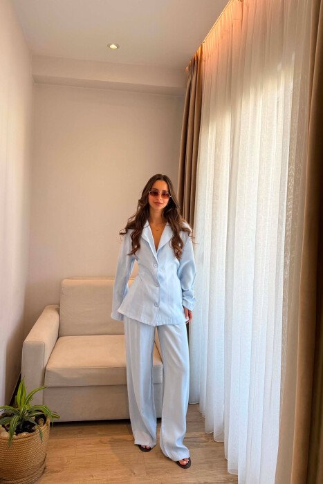 SET KEMISHE ME LIDHESE TEK BELI + PANTALONA PER FEMRA NE NGJYRE BLU TE ZBARDHUR 