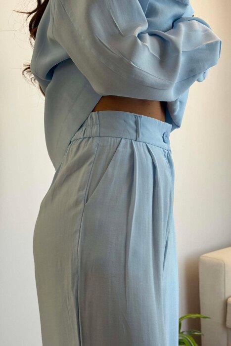 SET KEMISHE ME LIDHESE TEK BELI + PANTALONA PER FEMRA NE NGJYRE BLU TE ZBARDHUR - 4