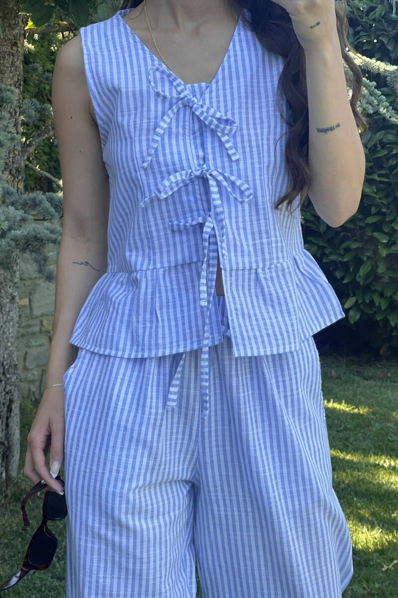 SET ME VIJA ME DETAJIN E LIDHSES KANATIERE+PANTALLONA PËR FEMRA NË NGJYRËN BLU E ZBARDHUR - 3