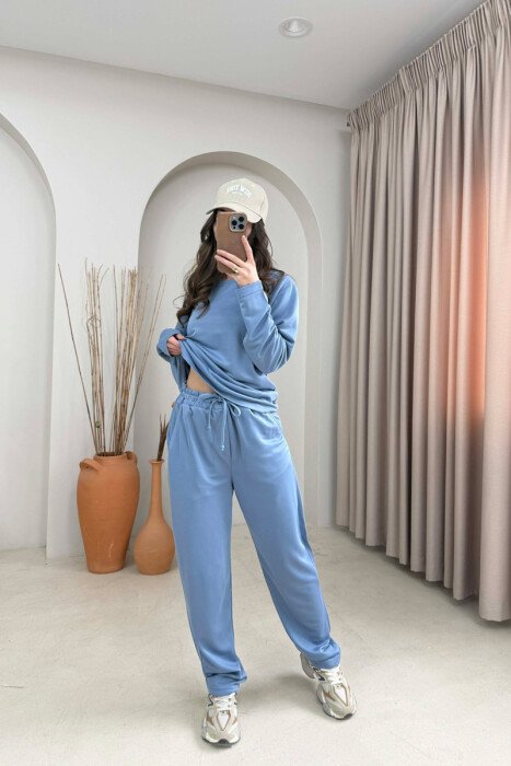 SET NJE NGJYRESH BLUZE + TUTA PER FEMRA NE NGJYRE BLU TE ZBARDHUR - 3