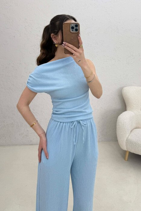 SET NJE NGJYRESH KANATJERE + PANTALLONA PER FEMRA NE NGJYRE BLU TE ZBARDHUR - 2