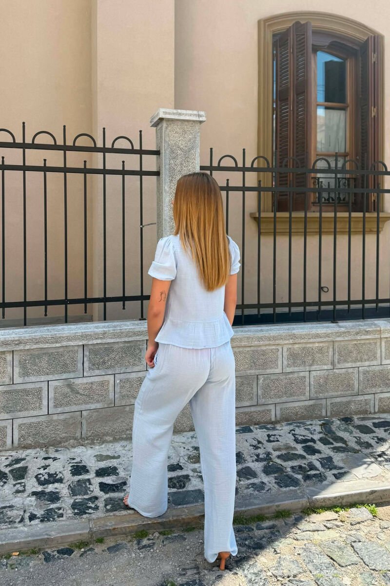 SET NJE NGJYRESH KEMISHE ME LIDHESE + PANTALLONA PER FEMRA NE NGJYRE BLU TE ZBARDHUR - 2